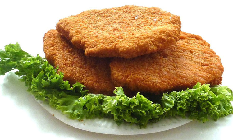 Шницель из курицы - вкусное блюдо из куриного мяса вы виде лепешки, может быть рубленый или натруральный